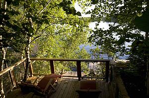 Lake of the Woods, Ontario, Canada; Dock and Lake Building overlooking the lake