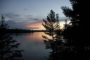Lake of the Woods, Ontario, Canada; Majestic sunset over placid lake