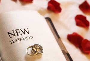 Wedding rings on the New Testament Bible