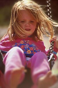 Girl on swing