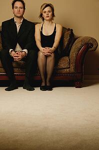 Couple sitting side by side
