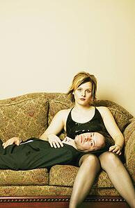 Couple hang out on the sofa