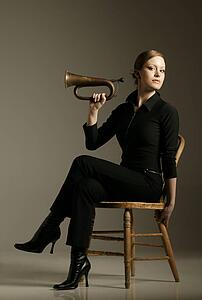 Sitting trumpet player