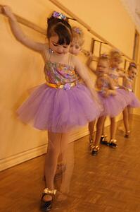 Little girls practice at Ballet class