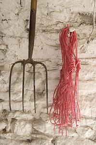 Farm Equipment Hanging On Wall