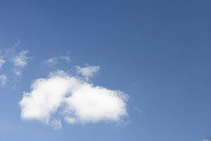 White Fluffy Cloud Against Blue Sky