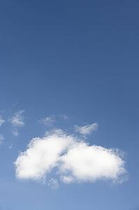 White Fluffy Cloud Against Blue Sky