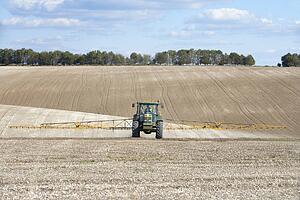 Tractor Spraying Field