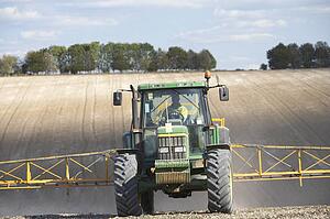 Tractor Spraying Field