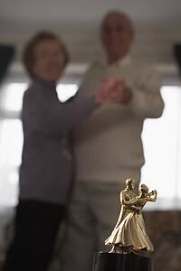 Senior Couple With Dance Trophy
