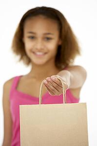 Young Girl Holding Shopping Bag
