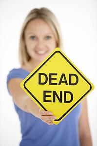 Woman Holding Road Traffic Sign