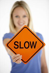Woman Holding Road Traffic Sign