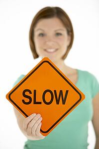 Woman Holding Road Traffic Sign