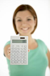 Woman Holding Calculator