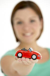 Woman Holding Toy Car