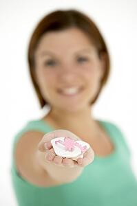Woman Holding Small Beach Sandals