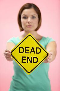 Woman Holding Road Traffic Sign