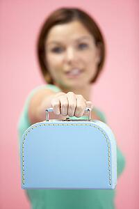 Woman Holding Suitcase