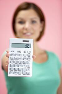 Woman Holding Calculator