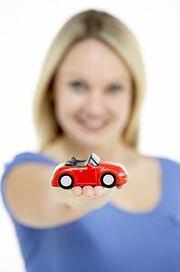 Woman Holding Toy Car
