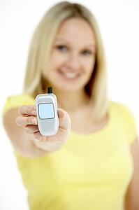 Woman Holding Model Mobile Phone
