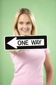 Woman Holding Road Traffic Sign