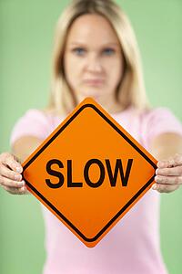 Woman Holding Road Traffic Sign