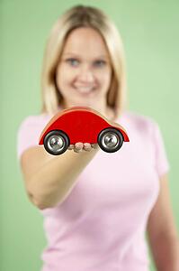Woman Holding Toy Car