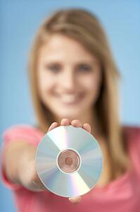 Teenage Girl Holding DVD