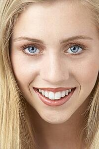 Portrait Of Young Woman Looking At Camera