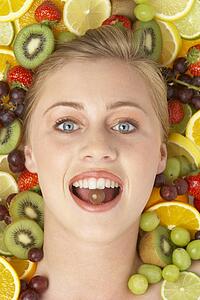 Portrait Of Young Woman Eating Chocolate