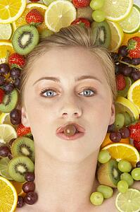 Portrait Of Young Woman Eating Chocolate