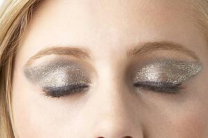 Close Up Of Young Woman Wearing Make Up