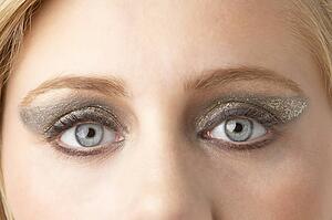 Close Up Of Young Woman Wearing Make Up