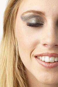 Close Up Of Young Woman Wearing Make Up