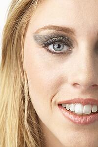 Close Up Of Young Woman Wearing Make Up