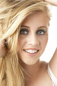 Close Up Of Young Woman Wearing Make Up