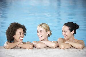 Three Female Friends In Swimming Pool