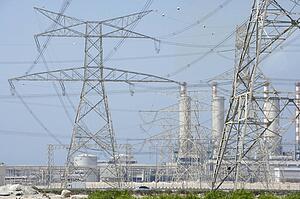 Electricity Pylons And Power Station