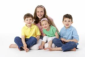 Group Of Young Children In Studio