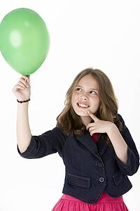 Young Girl Holding Party Balloon