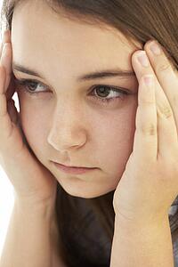 Portrait Of Stressed Young Girl