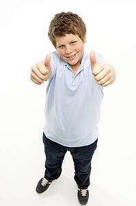 Full Length Portrait Of Young Boy