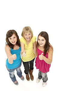 Group Of Three Young Girls In Studio