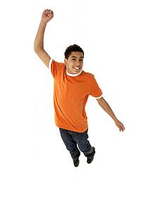 Young Boy Leaping In Studio