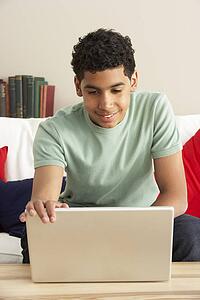 Boy Using Laptop
