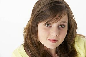 Portrait Of Thoughtful Young Girl
