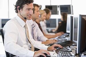 Stock Traders Working At Computers