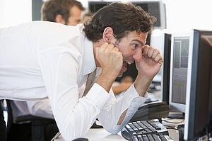 Stock Trader Overjoyed Looking At Monitor